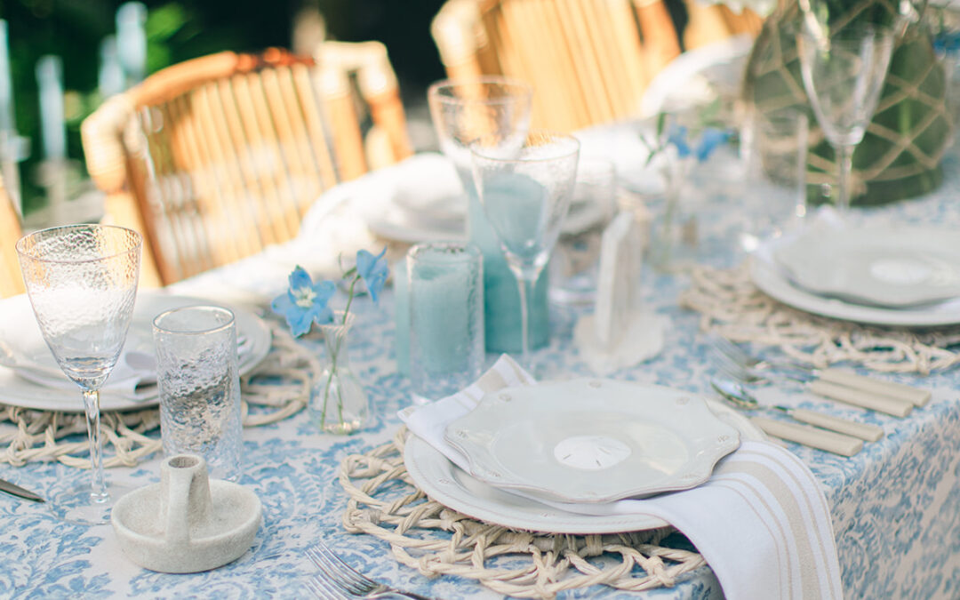 White wooden chair with slatted back for event seating.