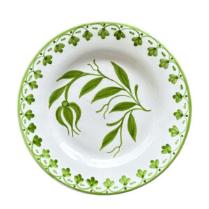 Green linen napkin with soft texture and natural hue.